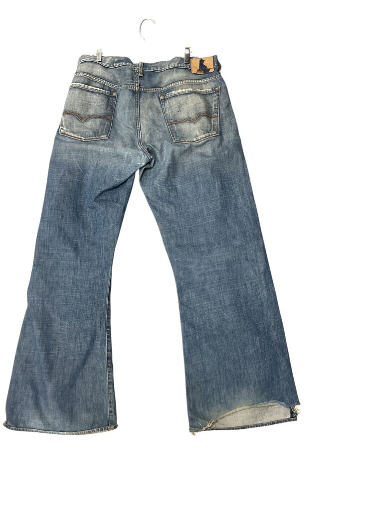 Guess distressed medium wash jeans